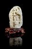 A Carved White Jade Boulder Height of jade 6 5/8 inches.
