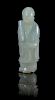 A Carved Jade Figure of a Standing Scholar Height of jade 3 7/8 inches.