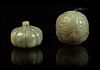 * Two Carved Jade Pebbles Width of first 1 3/8 inches.