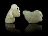 * Two Carved Jade Toggles Length of first 2 inches.