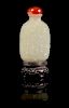 * A Carved Jade Snuff Bottle Height 3 3/4 inches (with stand).