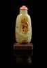 * A Carved Jade Snuff Bottle Height 3 1/4 inches (with stand).