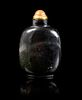 * A Black Jade Snuff Bottle Height 3 1/2 inches.
