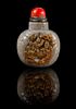 A Carved Hardstone Snuff Bottle Height 3 3/8 inches.
