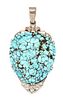 AN EARLY 20TH CENTURY TURQUOISE AND DIAMOND PENDANT, the of