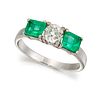 A THREE STONE DIAMOND AND EMERALD RING, the central old Eur