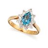 A 9CT TOPAZ AND DIAMOND CLUSTER RING, the pear shape topaz 