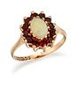 A 9 CARAT GOLD OPAL AND GARNET CLUSTER RING, the oval opal 