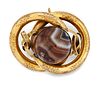 A VICTORIAN BANDED AGATE KNOT BROOCH, the central banded ag