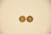 Two "Nederlandse Antillen 50 G" gold coins.
