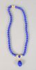 14K yellow gold with lapis beads necklace, 16" with teardrop lapis and small diamonds.