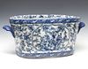 A 20C ASIAN STYLE BLUE AND WHITE TRANSFER FOOT BATH