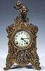AN ANSONIA 'CREST' HIGHLY ORNATE CAST METAL CLOCK