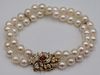 JEWELRY. Double Strand Pearl Bracelet with 14kt