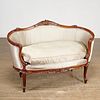 Louis XV style silk upholstered walnut settee