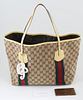 Gucci Brown Monogrammed Canvas Web Shopping Tote Shoulder Bag, the exterior with red and green canvas straps wrapping around bag wit...