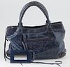 Balenciaga Dark Blue Distressed Leather Chevre Purse Shoulder Bag, the exterior with aged brass hardware and a front zip compartment...
