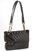 Chanel Black Quilted Calf Leather Shoulder Bag, c. 2020, with double gold chain handles interlaced with black leather, the interior...