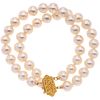CULTURED PEARLS WRISTBAND WITH 14K YELLOW GOLD BROOCH