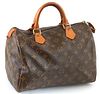 Louis Vuitton Brown Monogram Coated Canvas 30 Speedy Handbag, with golden brass hardware and vachetta leather handles, opening to a ...