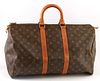 Louis Vuitton Brown Monogram Coated Canvas  45 Keepall Travel Bag, the vachetta leather straps with golden brass hardware, opening t...