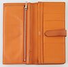 Hermes Orange Chevre Myzore Bearn Wallet, the calf leather with palladium plated hardware and pull through closure, opening to one c...