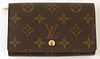 Louis Vuitton Porte-Tresor Zip Wallet, the brown monogram coated canvas with golden brass accents, opening to four main bill compart...