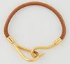 Hermes Jumbo Bracelet, with gold stainless hardware and brown calf leather band, L.- 6 3/4 in.