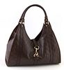 Gucci Dark Brown Guccissima Leather Joy Medium Tote Handbag, the exterior with golden brass hardware and top strap with a golden swi...