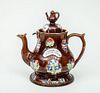 English Relief-Decorated Brown-Glazed Bargeware Teapot and Cover