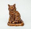 Rockingham Type Tortoise-Glazed Pottery Figure of a Seated Cat