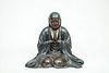 Japanese Lacquered Figure of a Seated Monk in Prayer