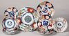 Eleven Imari porcelain plates and chargers