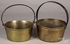 Seven brass and bell metal buckets and kettles