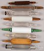 Seven glass rolling pins