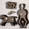 Four tin cookie cutters