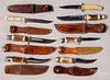 Seven fixed blade hunting knives and sheaths