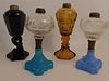 4 GLASS OIL LAMPS INCLUDING SANDWICH