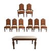 Comedor. Siglo XX. En talla de madera. Consta de: Mesa, 6 sillas y 2 sillones. Mesa con sistema de extensiones y extensiones. Pzs: 9