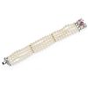 A 18K white gold, cultured pearl and ruby bracelet, defects