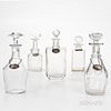 Five Varied Colorless Glass Decanters with Four Tiffany & Co. Sterling Silver Liquor Tags.