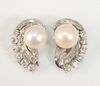 Pair of Platinum Pearl and Diamond Crescent Earrings
pearls measure approximately 9.5 millimeters each, inside a double crescent, outside crescent has
