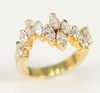 18 Karat Gold Ring 
set with twelve marquis diamonds
size 7 1/2
5.6 grams
