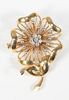 14 Karat Gold Floral Brooch
set with seven diamonds
12.7 grams