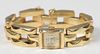 14K Yellow Gold Ladies Wristwatch by Hepa
square gold case, with gold bracelet
23.5 dwt.