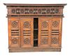 Walnut Two Part Cabinet
with sliding doors, and carved spindles
late 18th century - early 19th century, possibly Moorish or French
height 63 1/4 inche