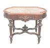 Victorian Walnut Center Table
with brown inset marble 
height 30 1/2 inches, top 25 1/2" x 41 1/2"
Provenance: Thirty-five year collection of Dana Coo