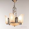 Three Art Deco Chandeliers, probably United States, c. 1930, nickel plated metal with openwork hanger, four shield-form frosted glass s