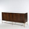 Paul McCobb for Calvin Irwin Collection Sideboard, Grand Rapids, Michigan, c. 1960, walnut, marble and brass, tri-fold doors cover four