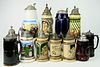 GROUPING OF (12) VINTAGE GLASS & PORCELAIN STEINS
